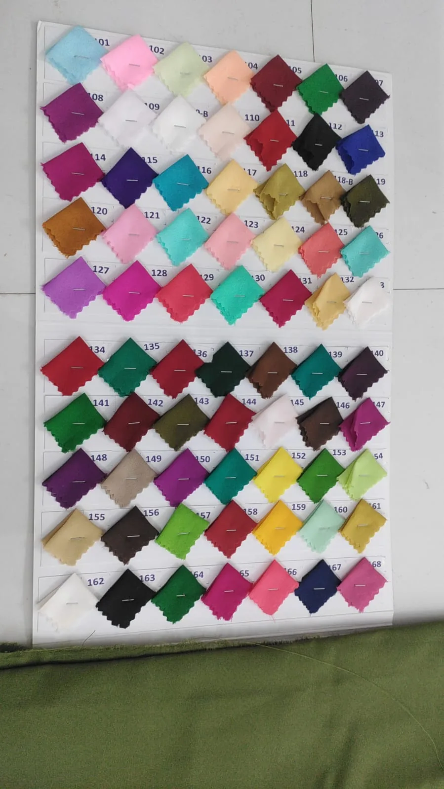 Jee Saa physical shade card showing many numbered lining fabric shades